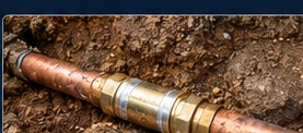 Copper pipe with a press-fit repair coupling.